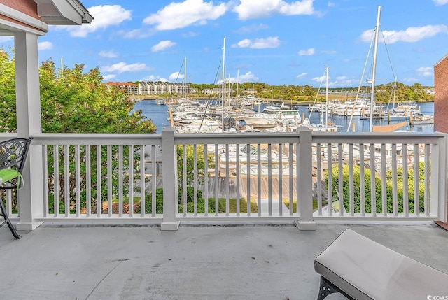 4755 Lightkeepers Way Unit 15-E, Little River, SC 29566 - balcony featuring a water view and a dock