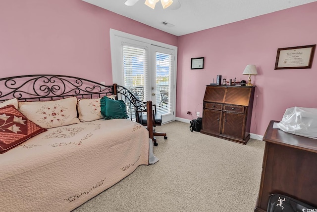 4755 Lightkeepers Way Unit 15-E, Little River, SC 29566 - carpeted bedroom featuring baseboards, visible vents, ceiling fan, and access to exterior