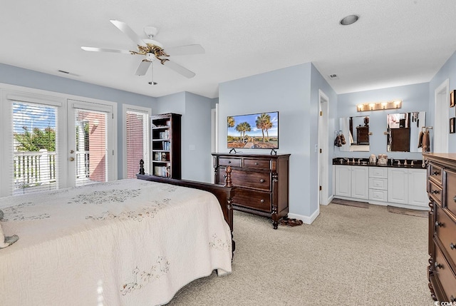 4755 Lightkeepers Way Unit 15-E, Little River, SC 29566 - bedroom with visible vents, light carpet, baseboards, access to outside, and a ceiling fan