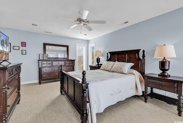 4755 Lightkeepers Way Unit 15-E, Little River, SC 29566 - bedroom with visible vents, a ceiling fan, baseboards, and light colored carpet