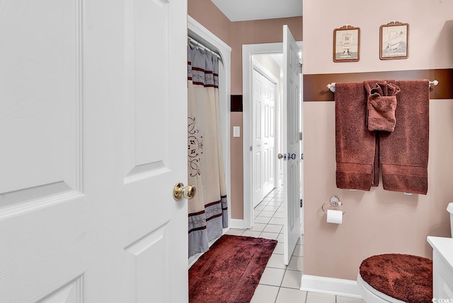 4755 Lightkeepers Way Unit 15-E, Little River, SC 29566 - bathroom with tile patterned flooring, baseboards, curtained shower, and toilet