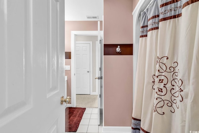 4755 Lightkeepers Way Unit 15-E, Little River, SC 29566 - full bath with visible vents, tile patterned flooring, and a shower with curtain