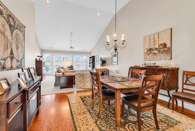 4755 Lightkeepers Way Unit 15-E, Little River, SC 29566 - dining space with high vaulted ceiling, ceiling fan with notable chandelier, recessed lighting, and wood finished floors