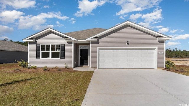 single story home featuring concrete driveway, a front lawn, and a garage