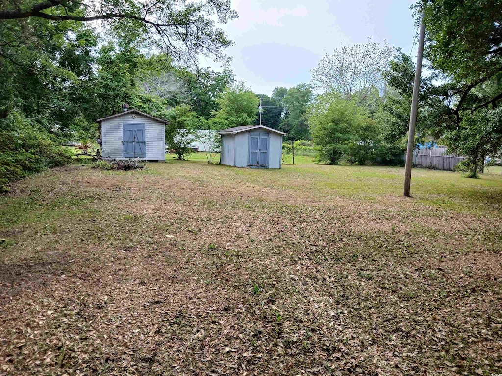 721 French Collins Rd, Conway, SC 29526 - view of yard featuring a storage unit