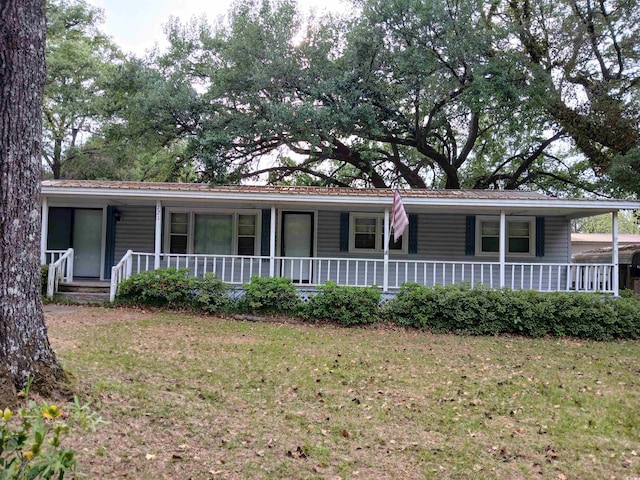 721 French Collins Rd, Conway, SC 29526 - view of front facade with covered porch and a front lawn