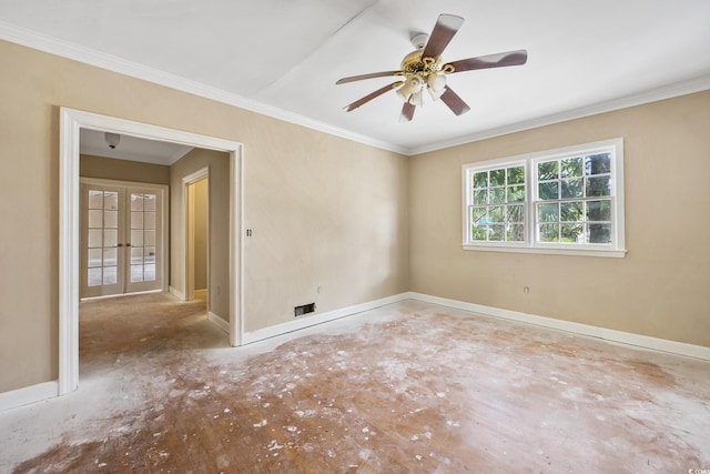 spare room with a ceiling fan, baseboards, crown molding, and french doors