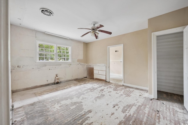 unfurnished bedroom with visible vents and ceiling fan