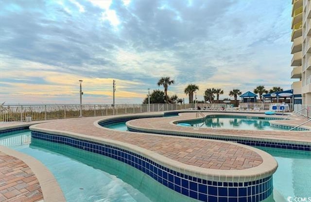 2701 S Ocean Blvd Unit 1507, North Myrtle Beach, SC 29582 - community pool with fence and a patio