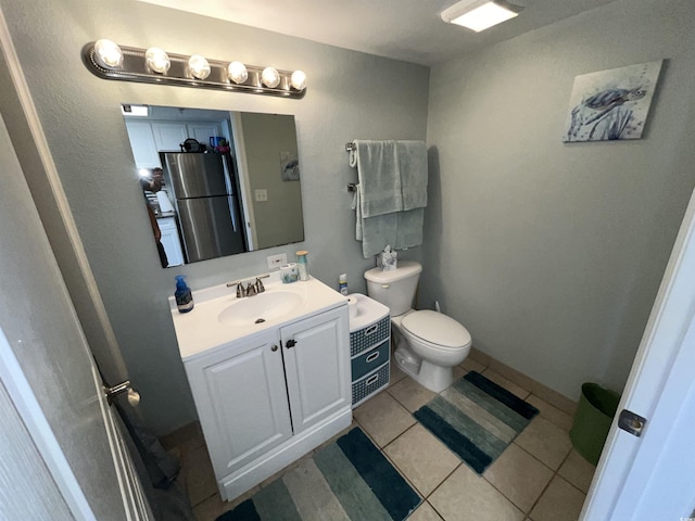 2701 S Ocean Blvd Unit 1507, North Myrtle Beach, SC 29582 - half bathroom with toilet, vanity, and tile patterned floors