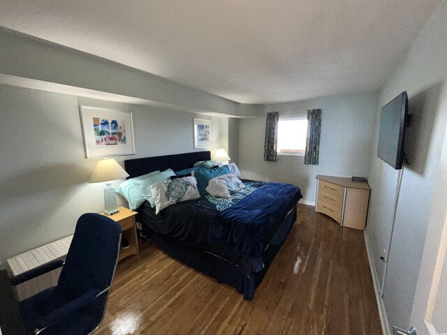 2701 S Ocean Blvd Unit 1507, North Myrtle Beach, SC 29582 - bedroom with wood finished floors