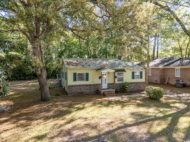 508 Pearl St, Conway, SC 29527 - view of front of property featuring brick siding and metal roof