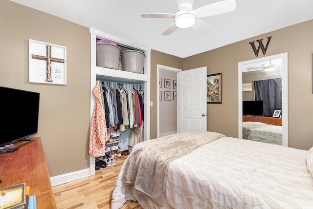 508 Pearl St, Conway, SC 29527 - bedroom featuring wood finished floors, a closet, ceiling fan, baseboards, and ensuite bath