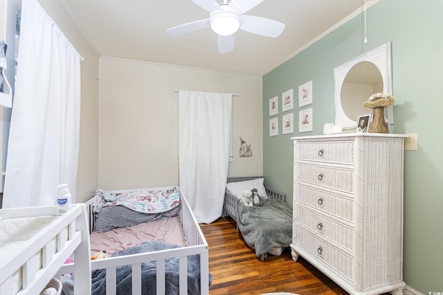 508 Pearl St, Conway, SC 29527 - bedroom featuring dark wood finished floors, crown molding, and ceiling fan