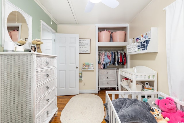 508 Pearl St, Conway, SC 29527 - bedroom with baseboards, wood finished floors, a closet, ceiling fan, and crown molding