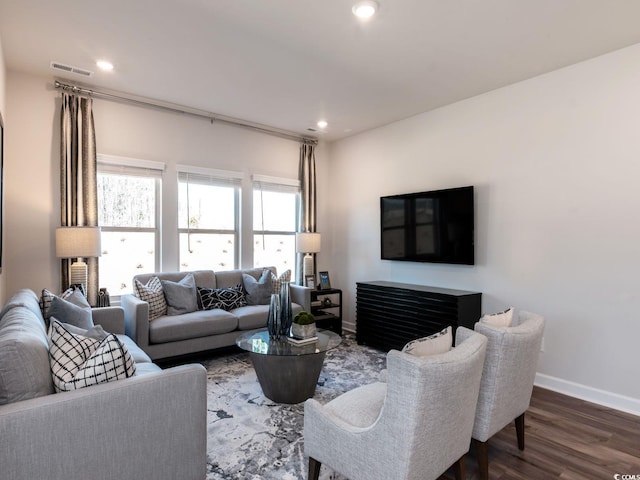 living room featuring recessed lighting, baseboards, dark wood finished floors, and visible vents