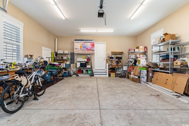 600 Waterbridge Blvd, Myrtle Beach, SC 29579 - garage featuring a workshop area and a garage door opener