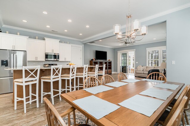 600 Waterbridge Blvd, Myrtle Beach, SC 29579 - dining space featuring an inviting chandelier, ornamental molding, light wood-style flooring, and recessed lighting