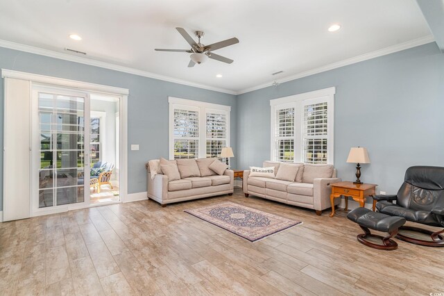 600 Waterbridge Blvd, Myrtle Beach, SC 29579 - living room featuring wood finished floors, visible vents, a ceiling fan, ornamental molding, and baseboards