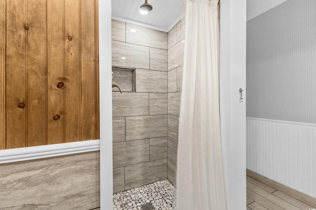 1012 N Waccamaw Dr Unit 507, Murrells Inlet, SC 29576 - bathroom with a tile shower, wainscoting, and wood finished floors