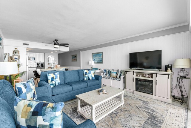 1012 N Waccamaw Dr Unit 507, Murrells Inlet, SC 29576 - living room featuring ornamental molding and a ceiling fan