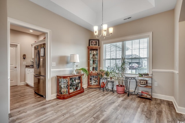 377 Copperwood Loop, Conway, SC 29526 - dining space featuring a chandelier, light wood-type flooring, and baseboards