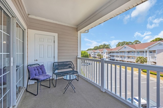 balcony featuring a residential view