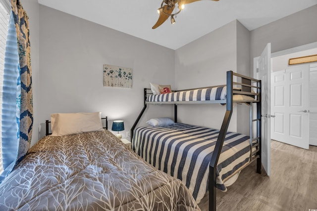 bedroom with wood finished floors and ceiling fan