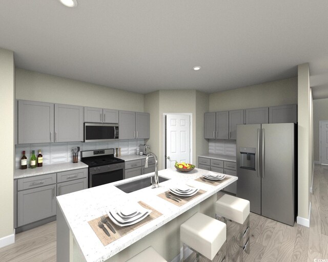 4337 Falls Oaks St, Myrtle Beach, SC 29579 - kitchen featuring a sink, light countertops, light wood-style flooring, stainless steel appliances, and gray cabinetry