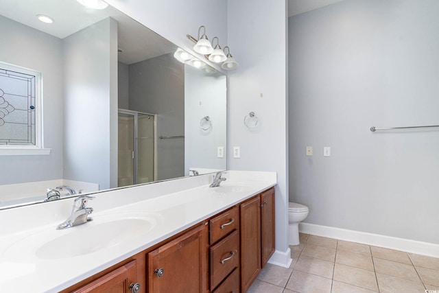 197 Northside Dr, Little River, SC 29566 - full bath with tile patterned floors, a stall shower, double vanity, and a sink