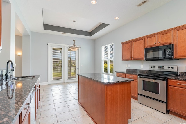 197 Northside Dr, Little River, SC 29566 - kitchen featuring electric stove, light tile patterned floors, a kitchen island, a sink, and black microwave