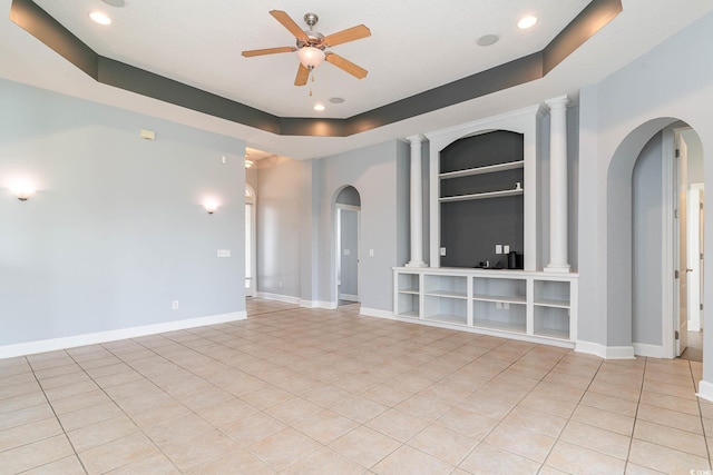 197 Northside Dr, Little River, SC 29566 - unfurnished living room with arched walkways, light tile patterned flooring, recessed lighting, a ceiling fan, and built in features