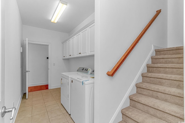 178 Kessinger Dr, Surfside Beach, SC 29575 - washroom featuring washing machine and clothes dryer, cabinet space, light tile patterned flooring, and baseboards