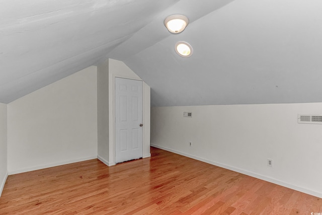 178 Kessinger Dr, Surfside Beach, SC 29575 - bonus room with light wood-style floors, vaulted ceiling, and baseboards