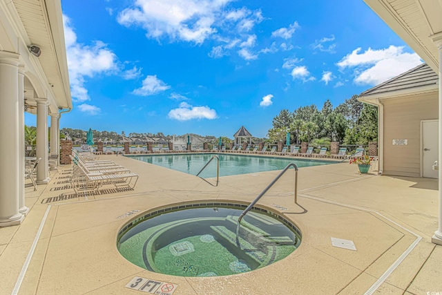 178 Kessinger Dr, Surfside Beach, SC 29575 - community pool with a community hot tub and a patio area