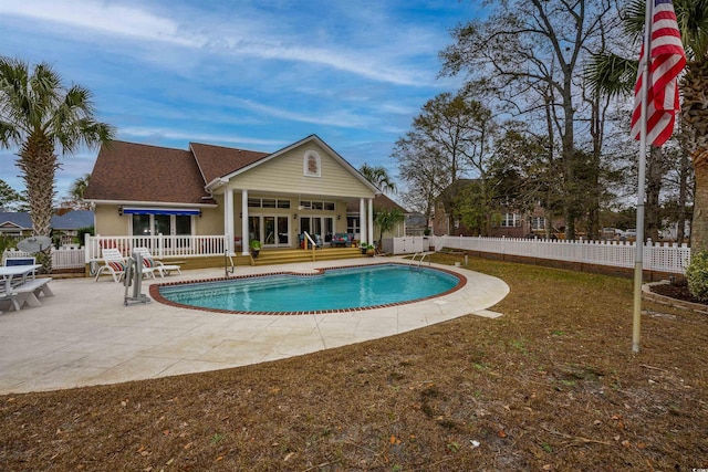 view of pool featuring a fenced in pool, fence private yard, and a patio