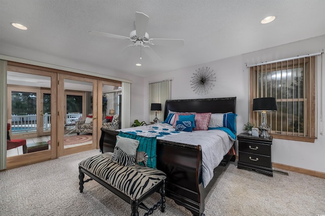bedroom with baseboards, access to outside, recessed lighting, french doors, and carpet flooring