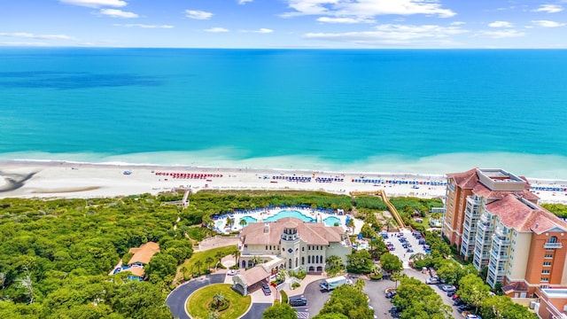 bird's eye view of waterfront with a beach