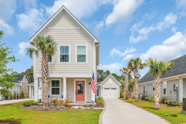 view of front of house with board and batten siding, a garage, a front lawn, driveway, and a porch