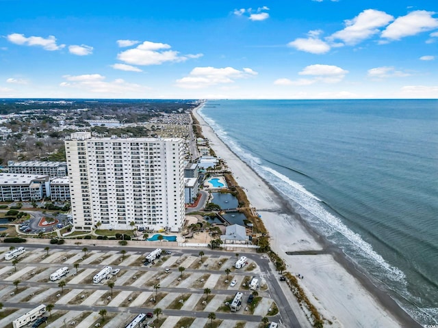 aerial view featuring a water view and a view of the beach