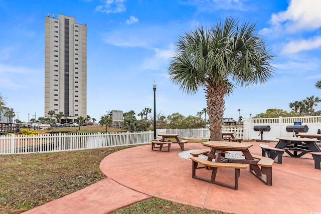 view of patio / terrace featuring fence