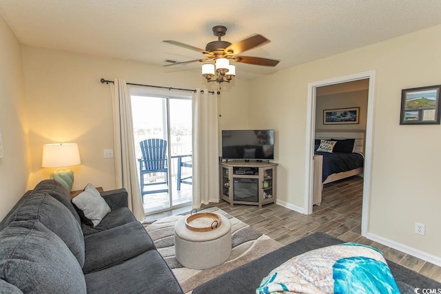 201 Landing Rd Unit D, North Myrtle Beach, SC 29582 - living room with ceiling fan, wood finish floors, and baseboards