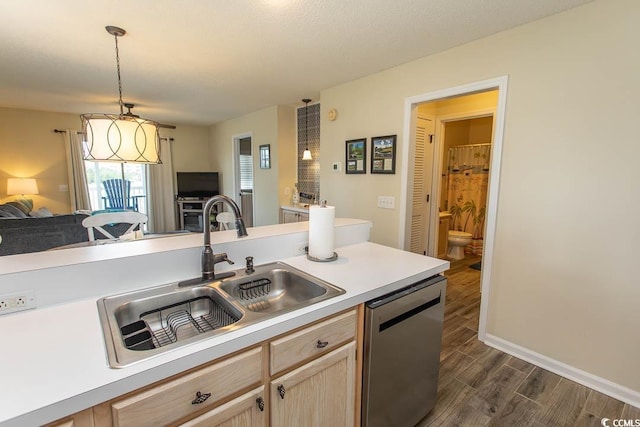 201 Landing Rd Unit D, North Myrtle Beach, SC 29582 - kitchen with light brown cabinetry, dishwasher, a sink, open floor plan, and dark wood-type flooring