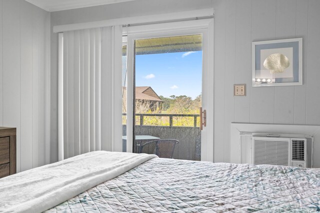 9501 Shore Dr Unit B-316, Myrtle Beach, SC 29572 - bedroom with a wall mounted air conditioner, a decorative wall, and access to outside