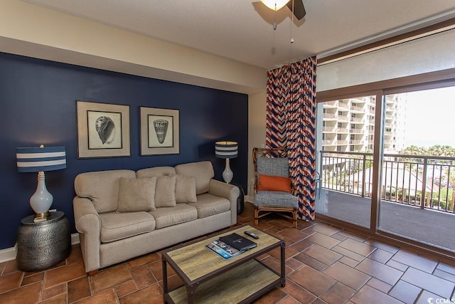 living room with a ceiling fan