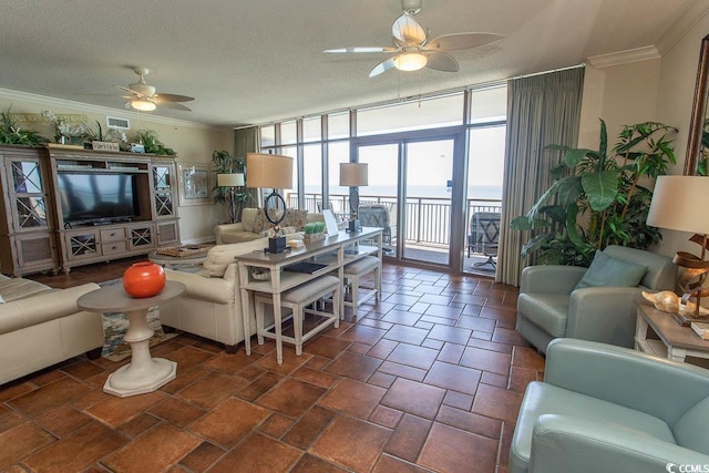 100 N Beach Blvd Unit 1801, North Myrtle Beach, SC 29582 - living area featuring crown molding, ceiling fan, a wall of windows, a textured ceiling, and visible vents