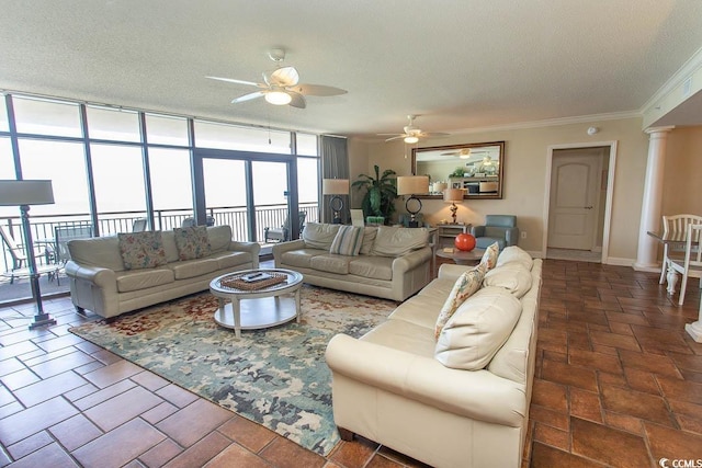 100 N Beach Blvd Unit 1801, North Myrtle Beach, SC 29582 - living area with crown molding, a ceiling fan, a textured ceiling, and baseboards