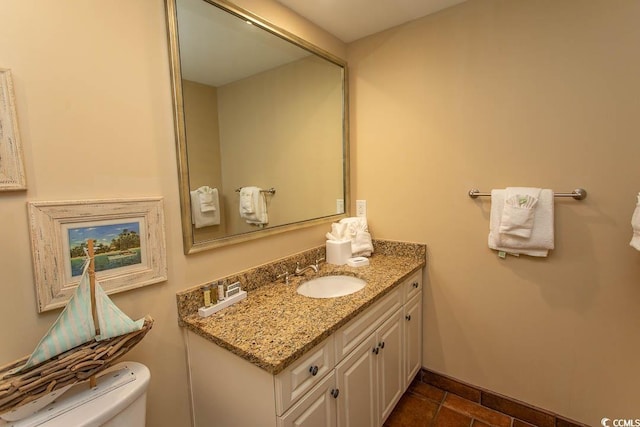 100 N Beach Blvd Unit 1801, North Myrtle Beach, SC 29582 - bathroom featuring vanity, baseboards, and toilet