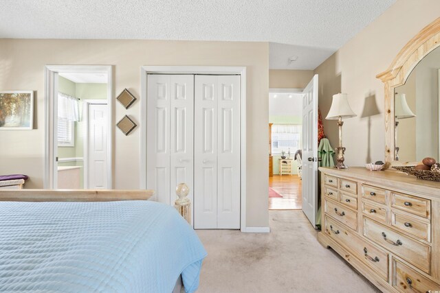 820 9th Ave S, North Myrtle Beach, SC 29582 - bedroom featuring light colored carpet, a closet, and baseboards