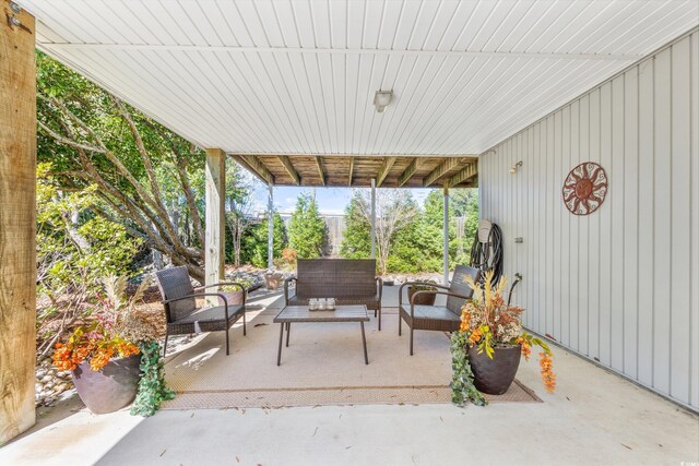 820 9th Ave S, North Myrtle Beach, SC 29582 - view of patio / terrace featuring outdoor lounge area